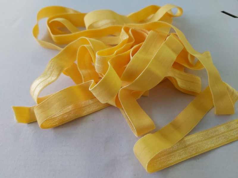Oranje/geel omvouw elastiek 4 meter